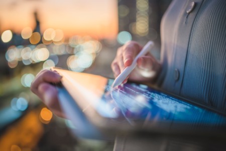 woman working on a tablet